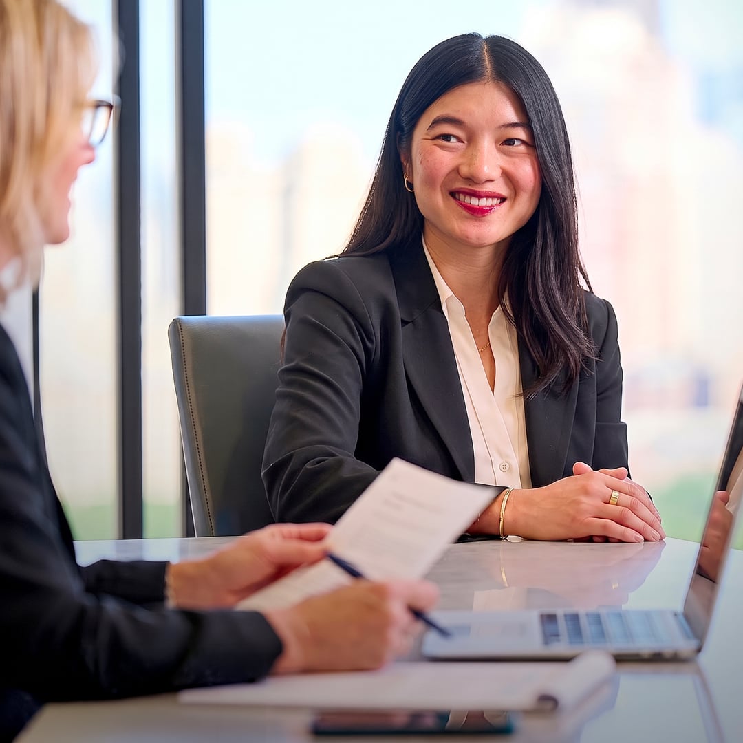 Weil Boston lawyers meeting at a conference table