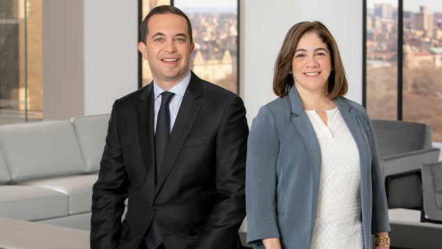 Male and Female Attorneys in Weil Office